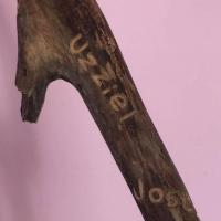 The names Uzziel and Joseph carved into the staff