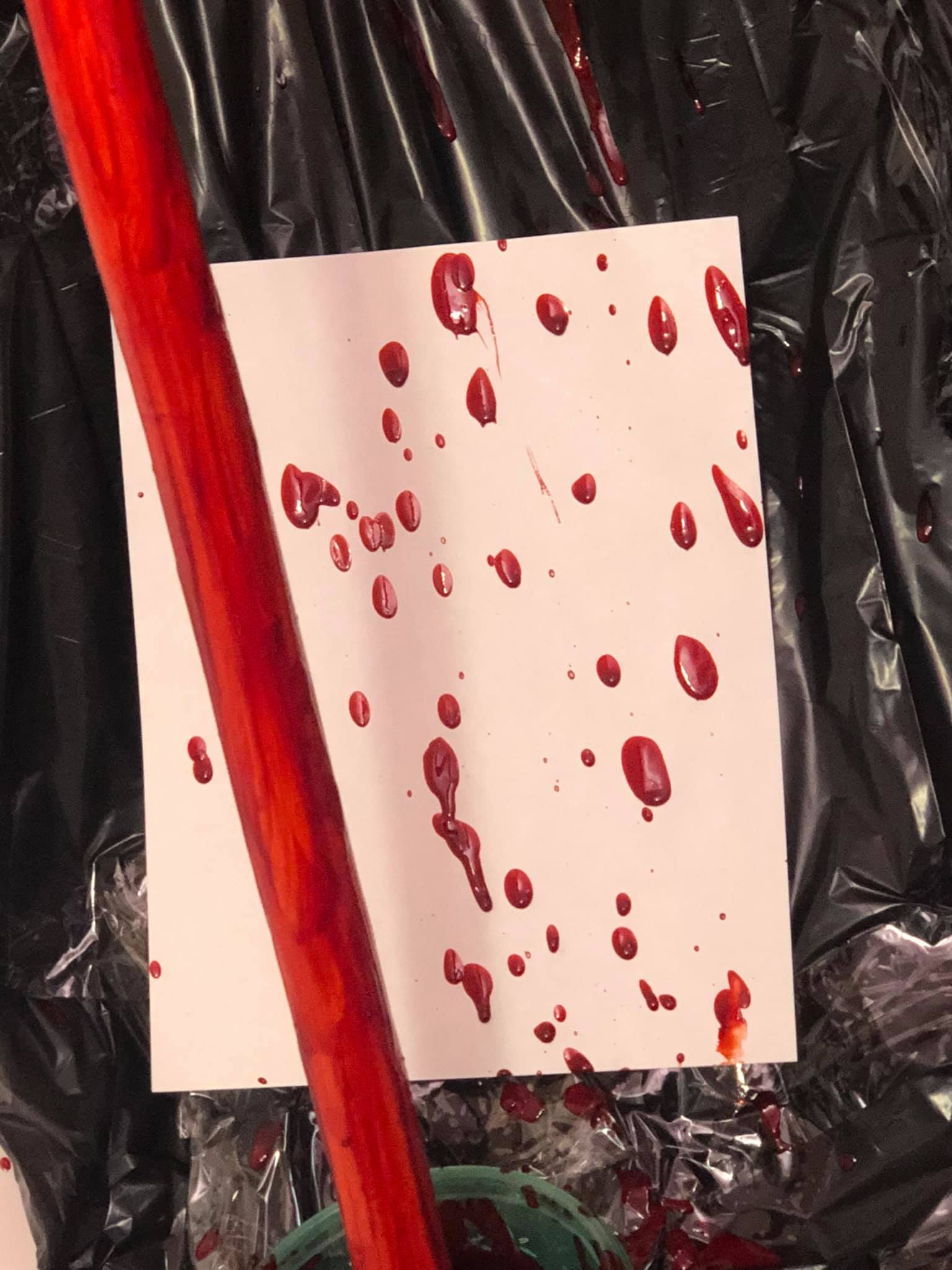 Droplets of blood, in a very vivid contrast of red against white. This is the lower canvas.