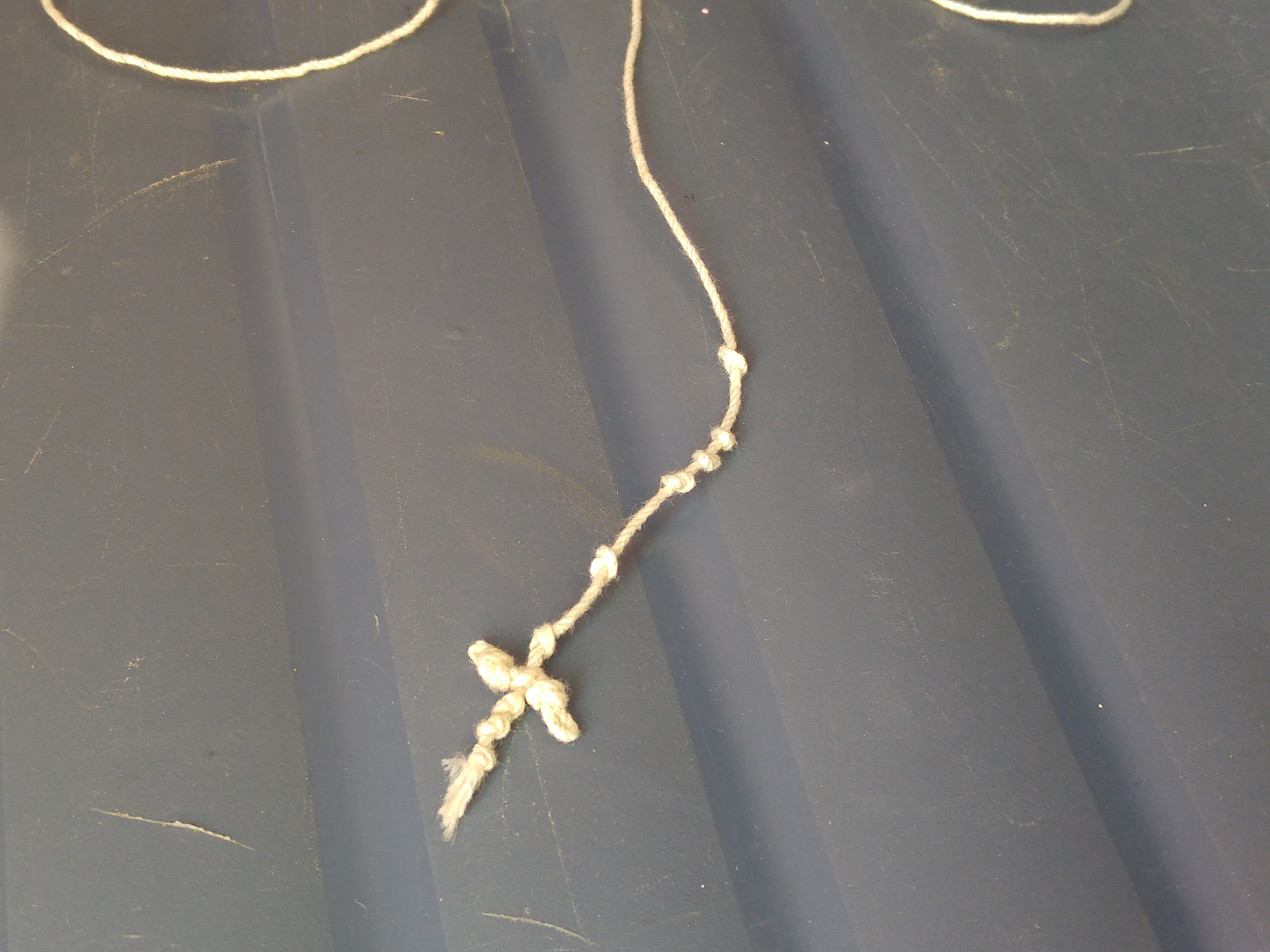 The first five knots in the string.