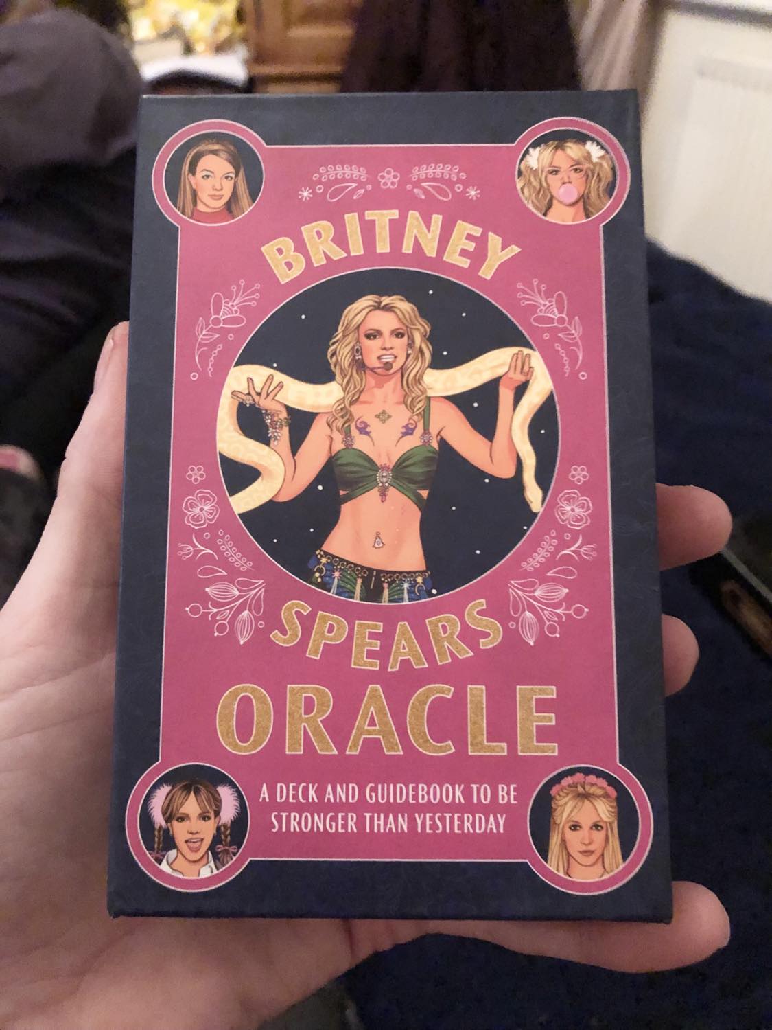 Britney Spears Oracle, which I had to get because it's Britney Spears, I mean c'mon! Kabutroid is just holding it up with her bed and room in the background. The tagline at the bottom of the box calls it a deck and guidebook to be stronger than yesterday. Naturally.