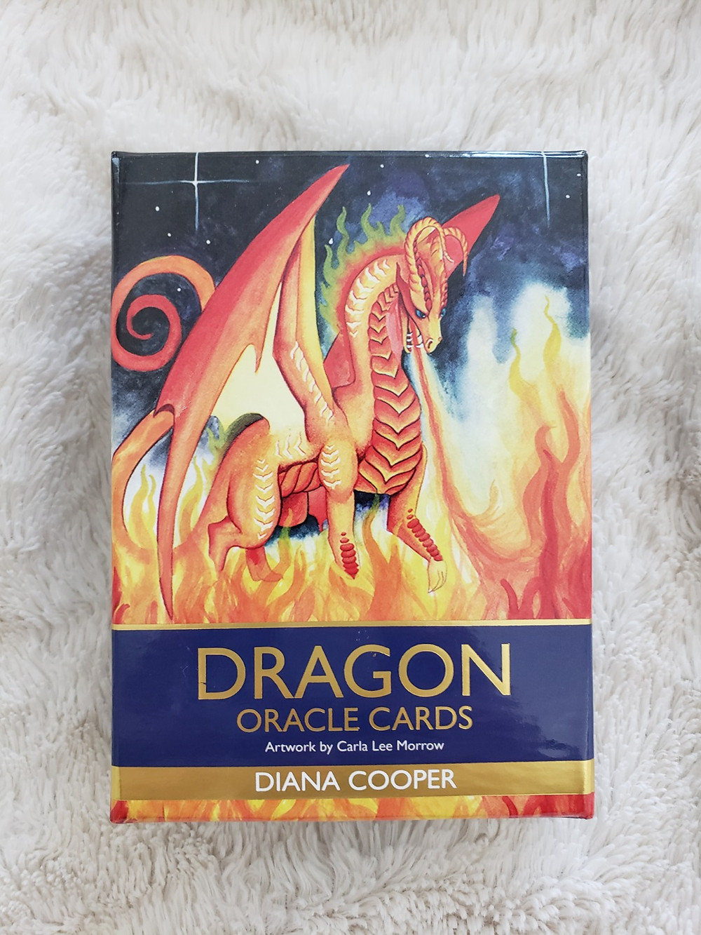 Dragon oracle cards, with a bright orange dragon on the front of the box.