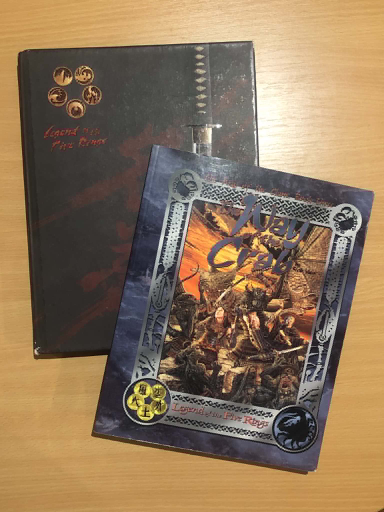 The Sailor Moon roleplaying game and resource book, laying on a wooden table.